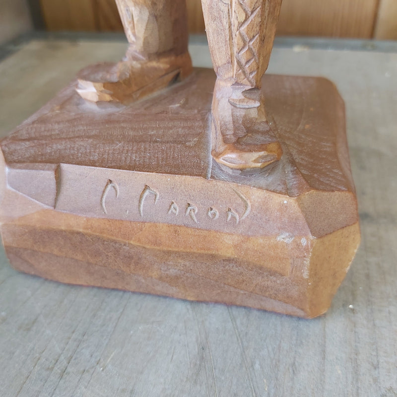 Wood Carving of man by Caron