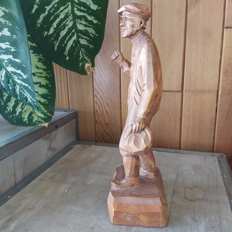 Wood Carving of man by Caron