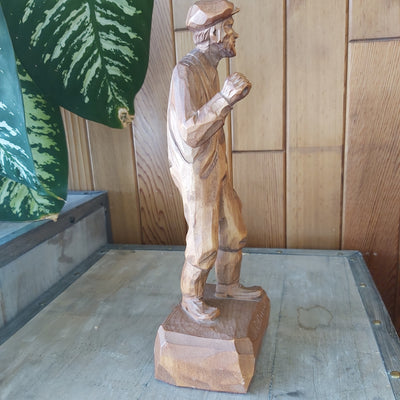 Wood Carving of man by Caron